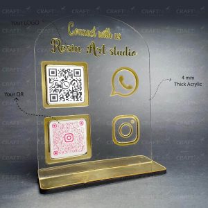 A premium QR Code Display showing a WhatsApp chat code and Instagram follow code on a glass table.